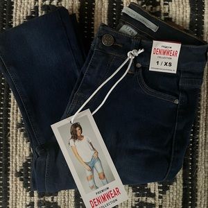 Skinny jeans in a dark denim color! New with tags.